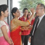 Prof. Sakai receiving bindu at a reception